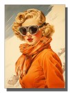 Kvinne med retro skibriller , oransje jakke og skjerf  thumbnail
